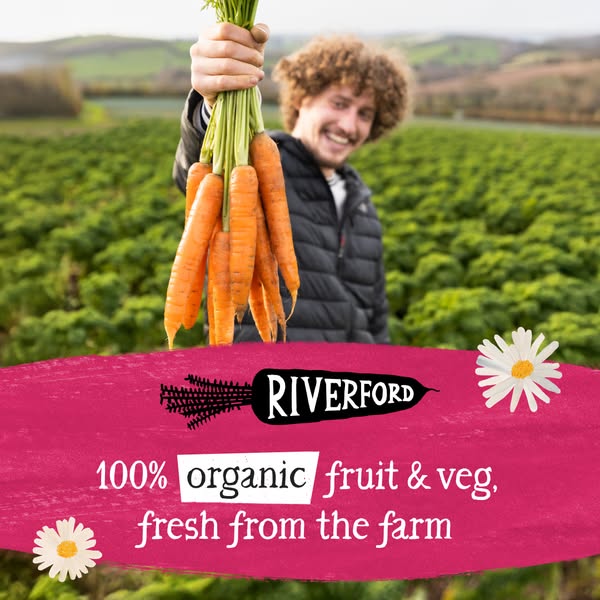 This image ad for Riverford promotes the brand's selection of organic fruits and vegetables by showcasing freshly ha