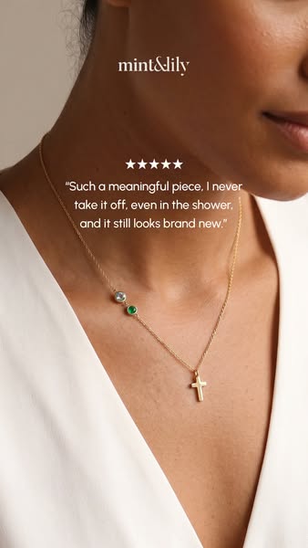 This ad features a close-up shot of a woman wearing a Mint & Lily necklace with a cross pendant. Text above the neck