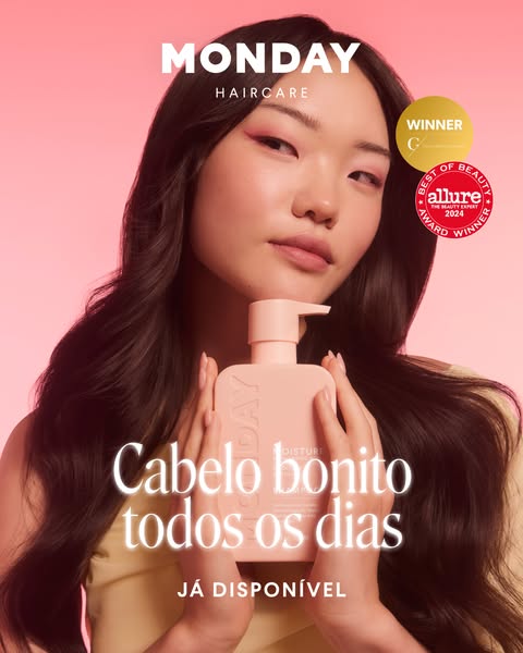 Image ad for MONDAY Haircare featuring a woman with dark hair holding a pink MONDAY Haircare bottle with the text, “Cabe
