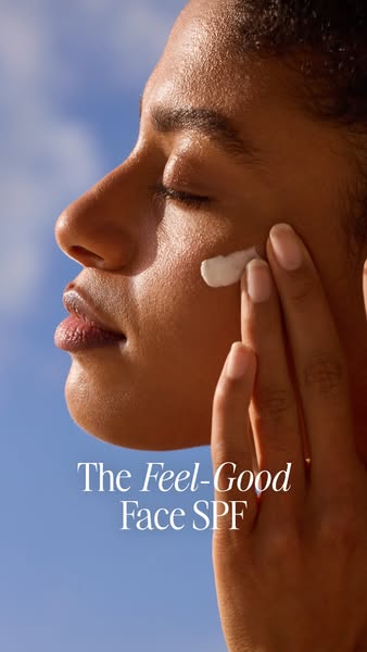 This image ad showcases a face SPF product being applied by a person with tan skin against a sky background, emphasizing
