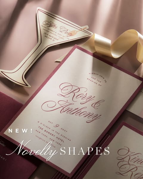 This image ad showcases wedding invitations featuring a cream-colored background and burgundy text. The ad highlights no