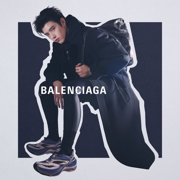 This ad features a person wearing Balenciaga apparel in a cutout photo. The brand name is prominently displayed in white