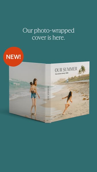 This ad promotes a photo album with a photo-wrapped cover. The image shows a family photo on the cover of a closed photo
