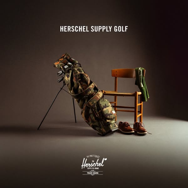 This ad showcases Herschel's golf bag and golf accessories through a studio shot image. The Herschel brand logo appe