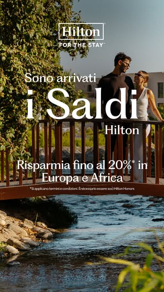 An image ad for Hilton showcasing a couple on vacation and promoting savings of up to 20% in Europe and Africa for Hilto