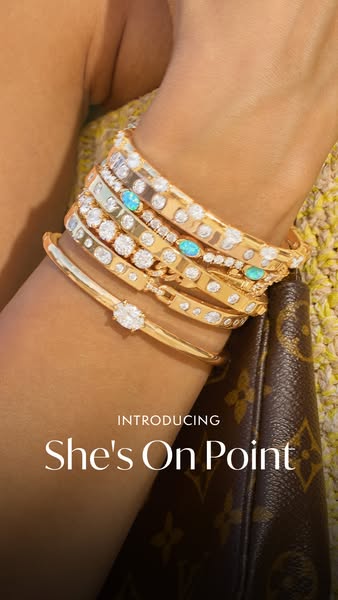 This ad showcases a collection of gold bracelets and promotes them under the name 'She's On Point'.