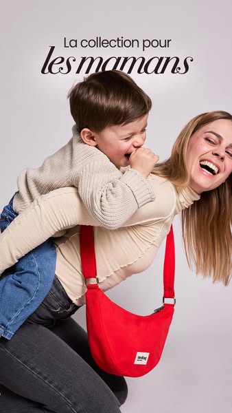 This image ad showcases a red handbag being worn by a woman with a child on her back, targeting mothers with a fashionab