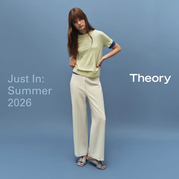 This ad features a single model in front of a blue background wearing clothes from Theory's new summer line.