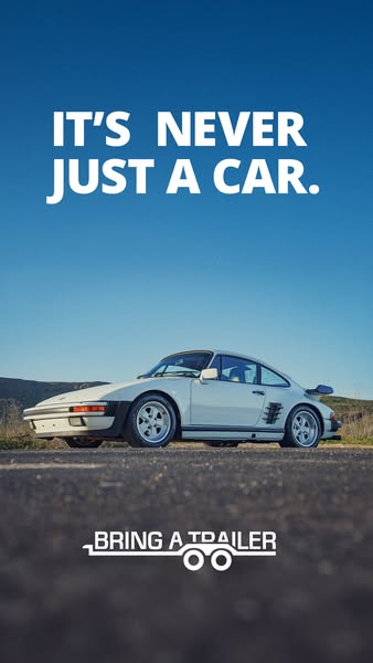 This image ad for Bring a Trailer features a vintage Porsche and the tagline, "It's never just a car."