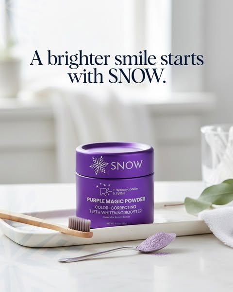 This ad features a purple container of SNOW teeth-whitening powder on a tray, accompanied by a toothbrush, spoon and loo