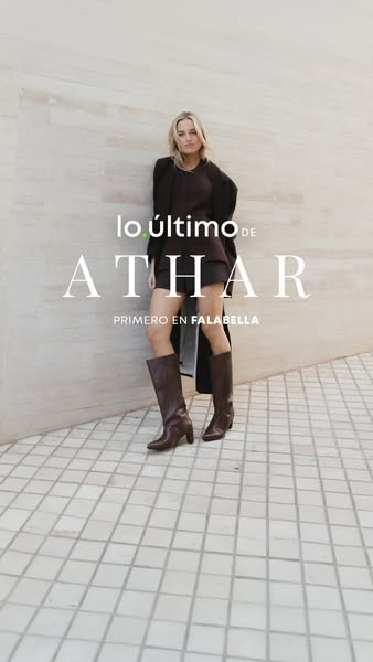 An ad for the brand ATHAR, available at Falabella, showcases a model wearing a monochrome brown outfit consisting of a b
