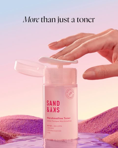 An ad for Sand & Sky Marshmallow Toner featuring someone demonstrating the product. The ad highlights the brand'