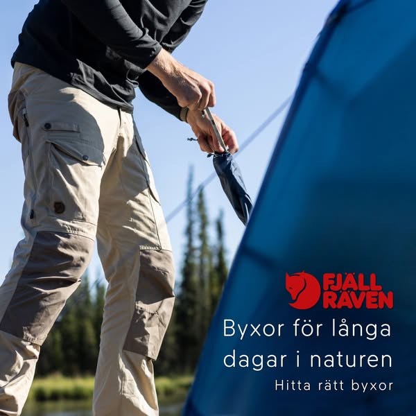 This ad for Fjallraven brand apparel shows a man wearing their branded pants and preparing to put them in a bag in an ou