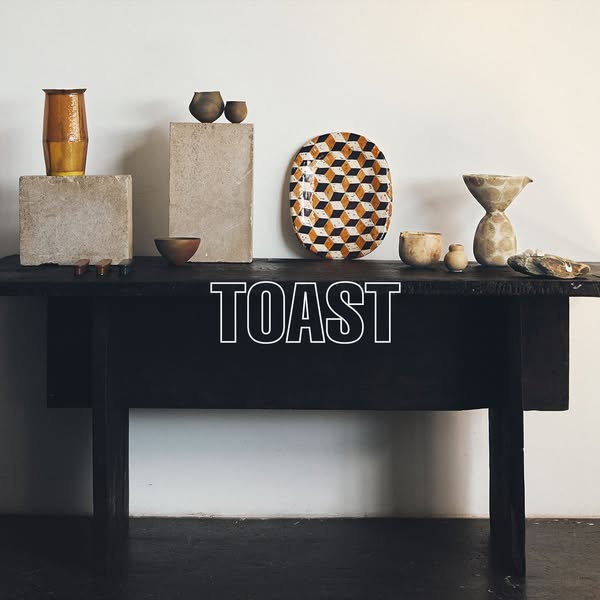 This image ad features various home goods such as vases, bowls, and plates. The ad showcases the brand TOAST.