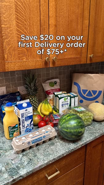 This image ad promotes a grocery delivery service by offering $20 off the first delivery order of $75 or more. The image