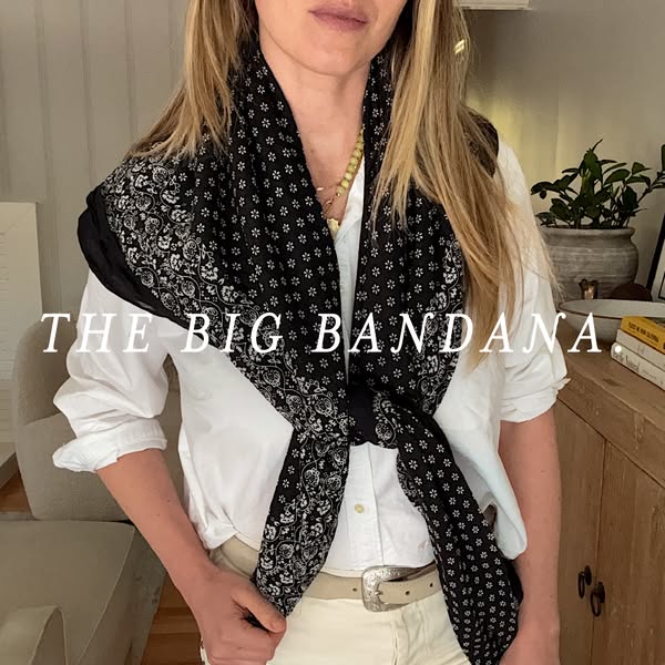 This ad features a woman wearing a black and white patterned bandana. The ad is likely designed to showcase a large band