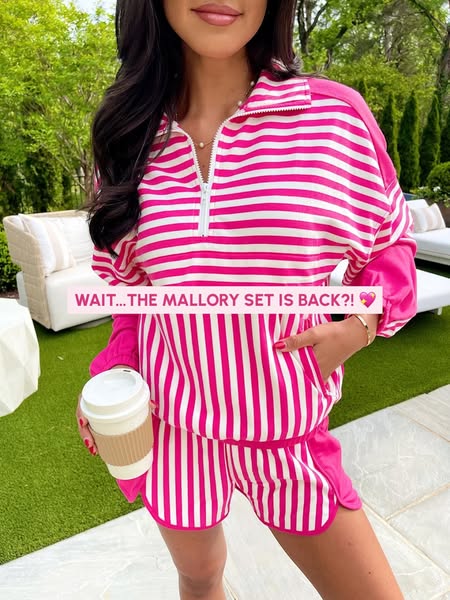 This image ad features a woman wearing a pink and white striped matching set, consisting of a long-sleeved zip-up top an
