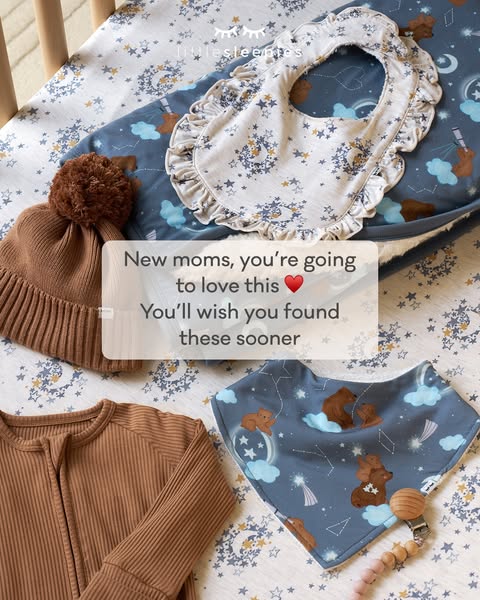 This image ad features various baby products, including bibs, clothing, and bedding, all arranged on or around a baby cr