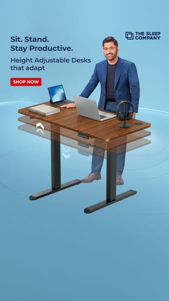 Ad for The Sleep Company promoting their height adjustable desks, which enable users to both sit and stand while staying