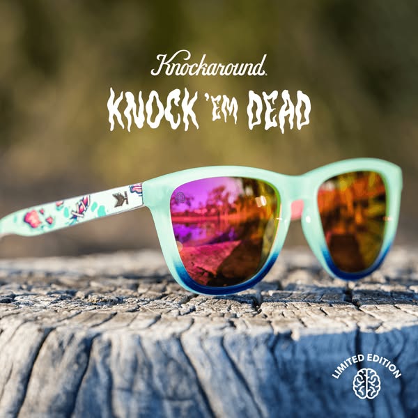 This ad by Knockaround showcases a pair of sunglasses with colorful mirrored lenses. The sunglasses are displayed on a t