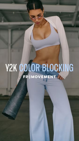 This image ad features a woman posing in workout clothes from FP Movement. The main focus of the ad is to showcase the Y