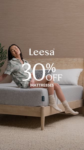 This ad from Leesa features an image of a woman sitting on a Leesa mattress, promoting a 30% off mattresses sale.