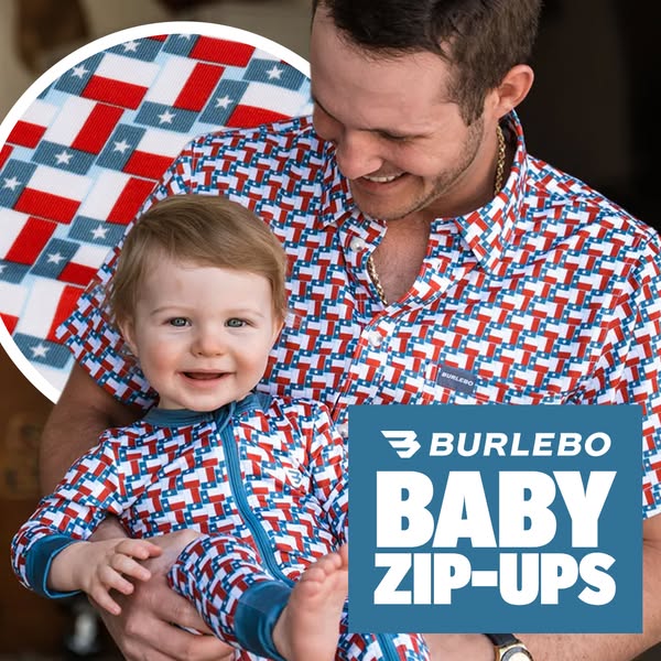 This image ad from Burlebo shows a man holding a toddler both wearing matching zip-up outfits with a repeating pattern o