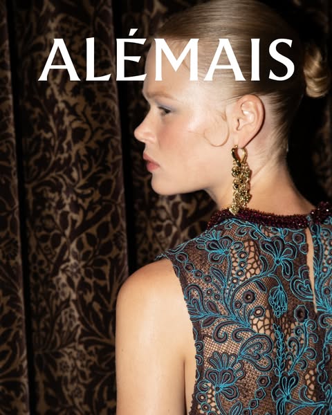 This image ad for ALÉMAIS features a model wearing a dress from the brand's collection. The close-up shot focuses on