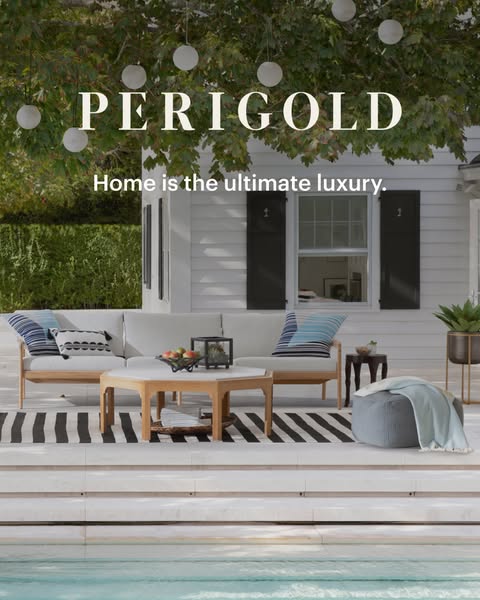 This image ad for Perigold showcases outdoor furniture and decorative elements. The scene features an inviting outdoor l