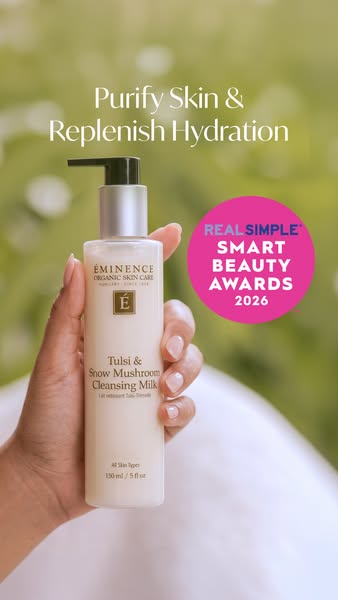 This image ad promotes Eminence Organic Skin Care's Tulsi & Snow Mushroom Cleansing Milk, highlighting its purif