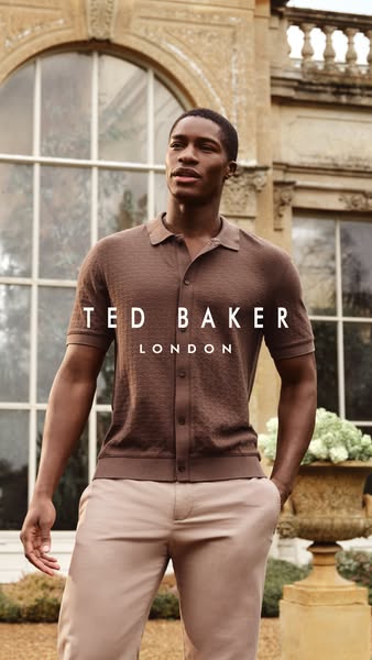 This image ad showcases the Ted Baker London polo shirt. It features a well-dressed man in front of an upscale building 
