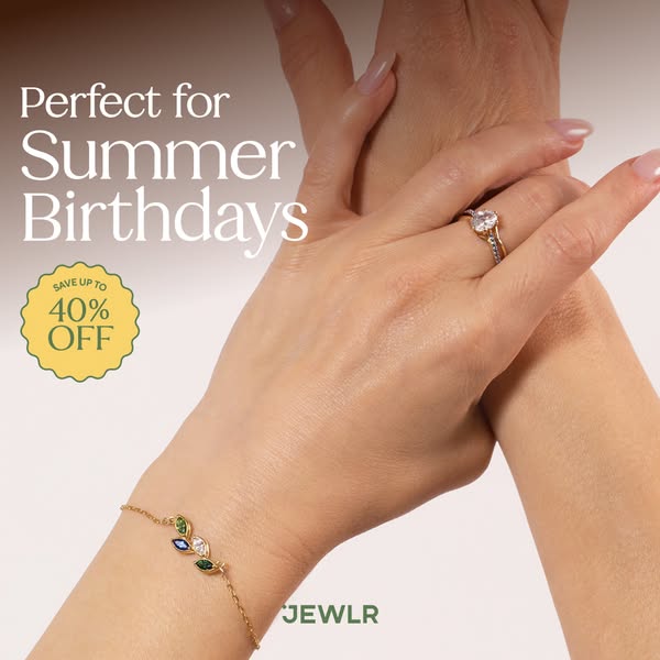 This image ad for JEWLR features a close up of a person's hands with JEWLR rings and a bracelet. The ad features the