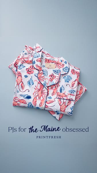 This image ad features a folded set of Printfresh pajamas with a lobster and seashell print. The ad is targeted to peopl
