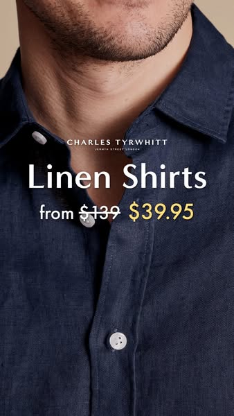 This image ad promotes linen shirts from Charles Tyrwhitt, showcasing a close-up of a man wearing a navy blue linen shir