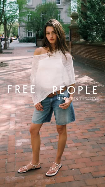 This image ad from Free People showcases a stylish, relaxed summer look ideal for urban settings. The ad features a woma