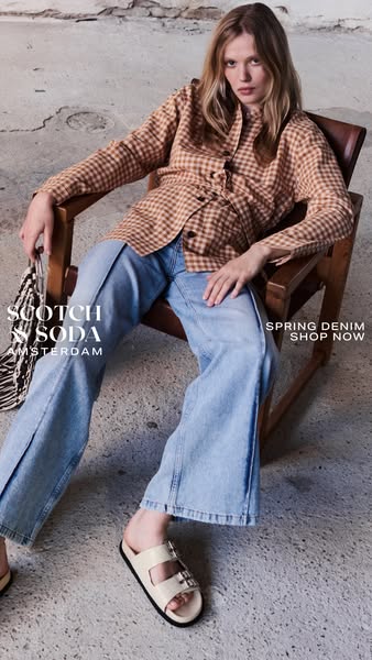 An ad for Scotch & Soda clothing featuring a woman sitting in a chair wearing the brand's clothing. The text enc