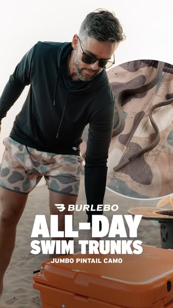 This ad features a model wearing Burlebo brand swim trunks with a cooler sitting on the beach, suggesting that the trunk