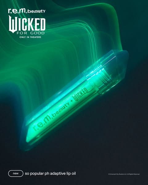 This ad showcases r.e.m. beauty's new pH adaptive lip oil in collaboration with the musical 'Wicked'. The ad