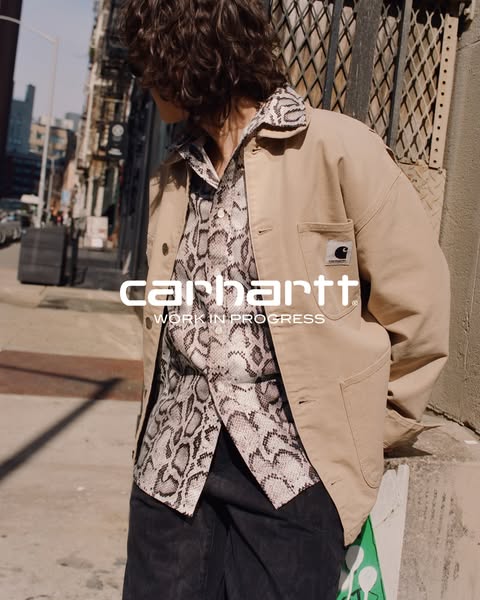 This ad features an urban setting, highlighting the Carhartt Work in Progress (WIP) brand with a focus on fashion-forwar