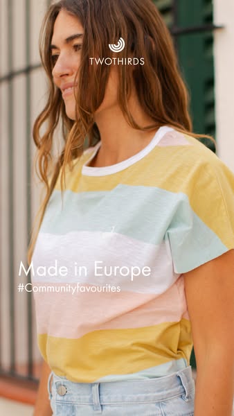 An image ad featuring a woman wearing a TwoThirds t-shirt, highlighting the brand's European production and appealin