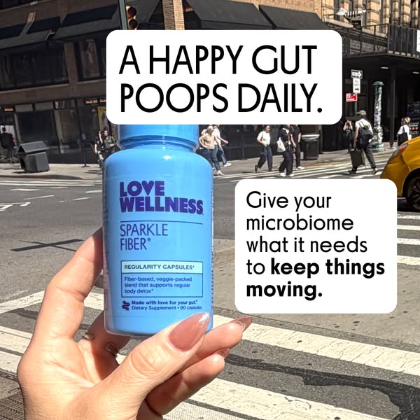 The ad promotes Love Wellness Sparkle Fiber supplement. It suggests taking the product to achieve regular bowel movement