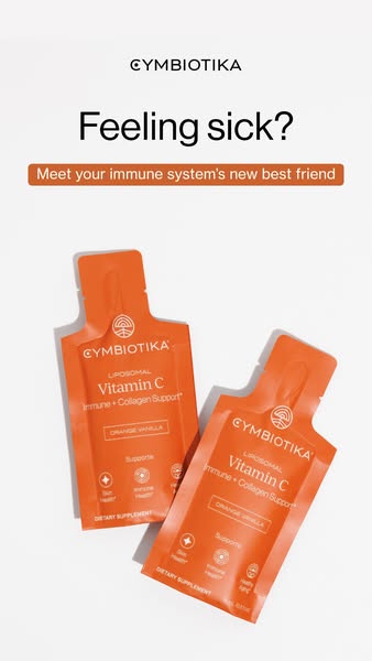 This image ad by Cymbiotika promotes their Liposomal Vitamin C supplement. The ad features two orange packets of the sup