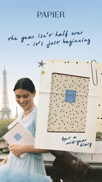 This image ad for Papier promotes their mid-year diary. The ad features a woman smiling and holding a diary in front of 