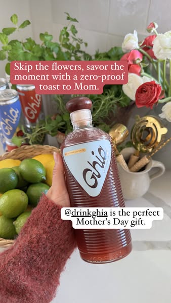 This ad for Ghia non-alcoholic apéritif features an image of the bottled drink in a home kitchen setting, with text prom