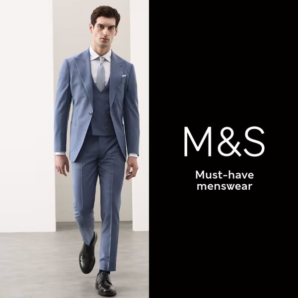 The image ad features a man modeling a three-piece suit for Marks & Spencer. The man is walking toward the viewer an
