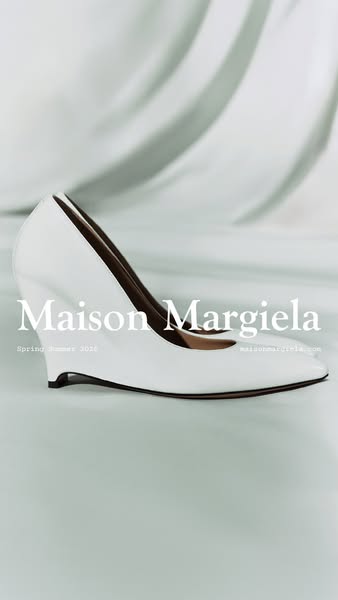 This ad showcases a single white shoe. The ad is minimal, with the Maison Margiela logo in the lower center.