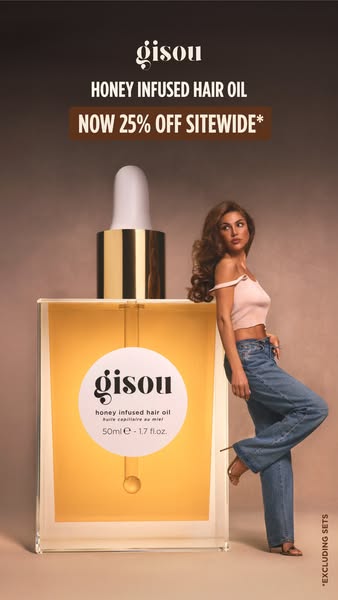 This image ad showcases Gisou's Honey Infused Hair Oil with a sitewide discount offer. The ad features a model with 