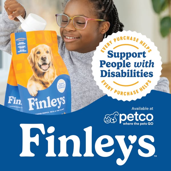 The ad shows a young girl with glasses standing in front of a bag of Finley's dog food. The ad communicates the bran