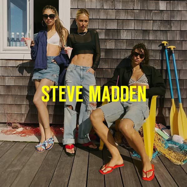 This ad for Steve Madden features three female-presenting models in a lifestyle shot wearing the brand's sandals and