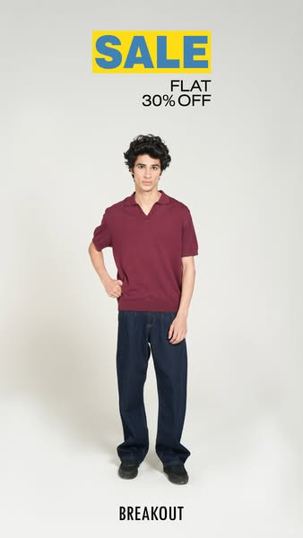 An image ad featuring a man wearing a Breakout polo shirt and jeans in front of a light grey background. The ad is adver